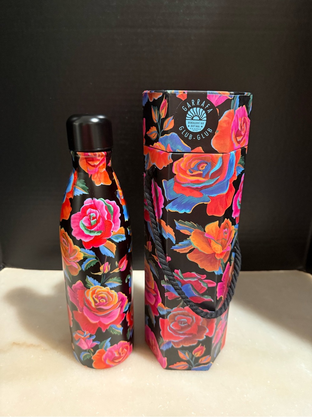 FARM Rio Black Bottle with Vibrant Pink, Orange and Blue Roses